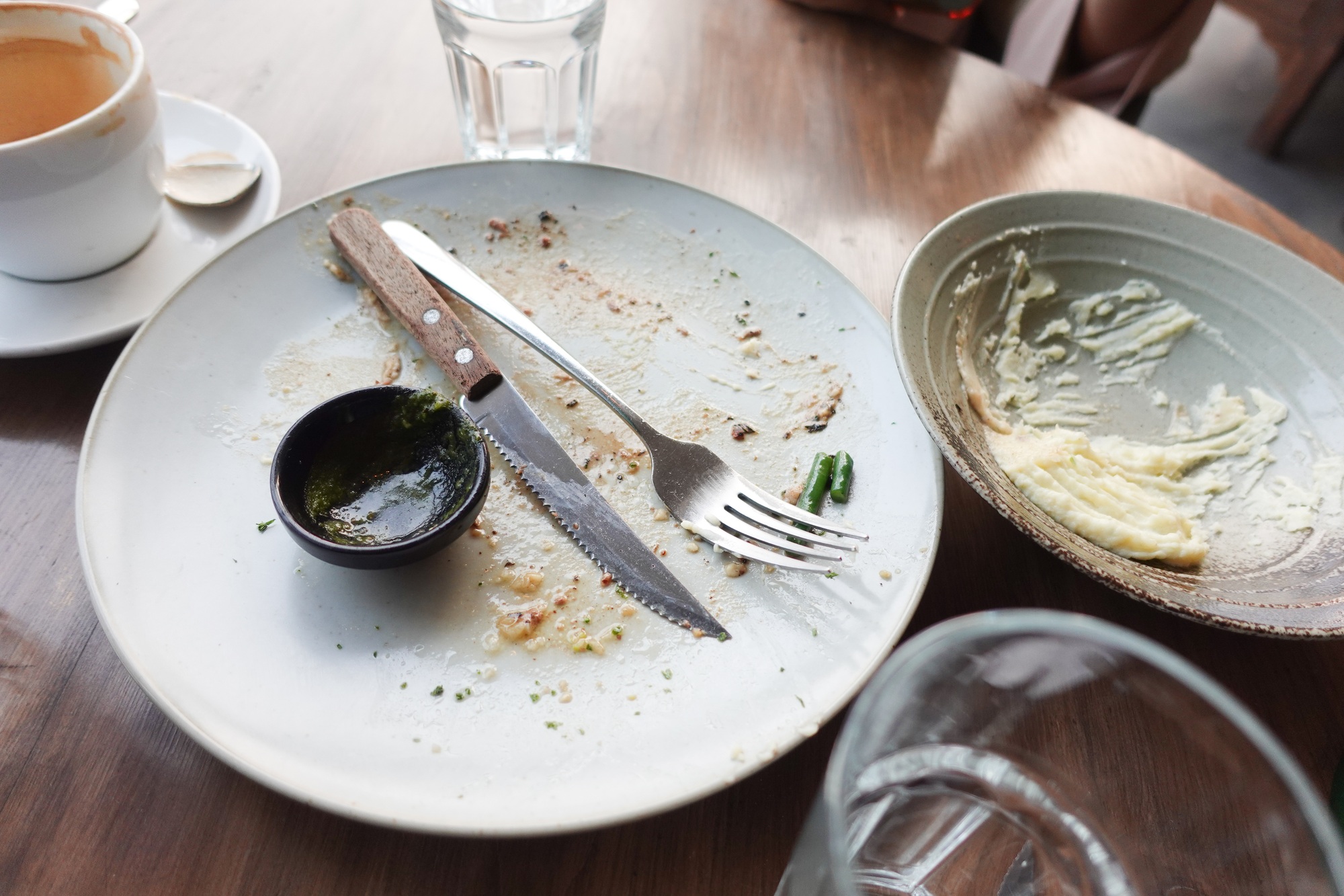 Empty plate after eating on table